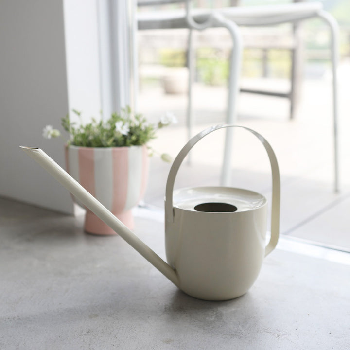 Cream watering can