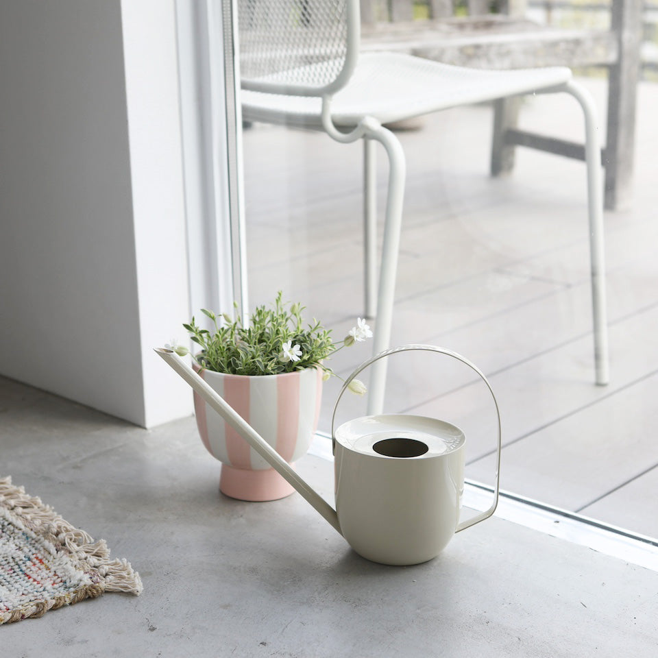 Cream watering can